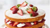 <p>Layer cakes are clearly grandma territory. It's nearly impossible to compete with any grandmother's best layer cake recipe, but this lightened version of a reader's favorite recipe  from her grandmother — a fresh, sweet, and creamy strawberry cake — is sure to be a hit, no matter who makes it.</p><p><b>Recipe: <a href="/recipefinder/strawberry-cream-cake-recipe" target="_blank">Strawberry Cream Cake</a></b></p>

