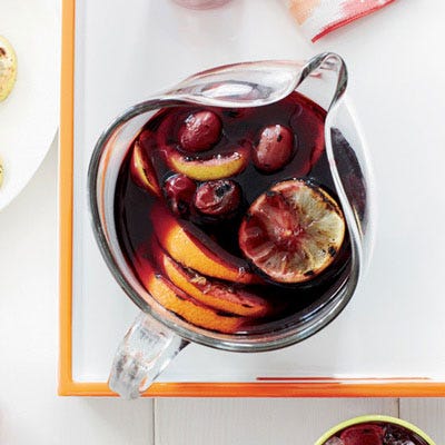 <p>Michael Chiarello prefers cooking fruit near the beginning of the grilling session, when the grate is cleanest. Here, grilled oranges, lemons and grapes add a wonderful, subtle smokiness to sangria. If you grill twice as much fruit as the recipe calls for, you'll be all ready to make a second batch.</p><p><b>Recipe: </b><a href="http://gogonow.org/grilled-citrus-grape-sangria-recipe-fw0613%22 target="_blank"><b>Grilled Citrus and Grape Sangria</b></a></p>
