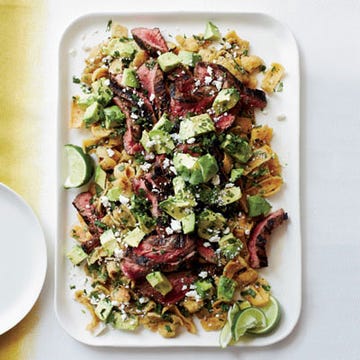 <p>To make his version of chilaquiles (fried tortilla chips lightly cooked in salsa), Jamie Bissonnette unabashedly opts for Fritos.</p><p><b>Recipe: </b><a href="http://gogonow.org/recipefinder/cola-marinated-flank-steak-frito-chilaquiles-recipe-fw0613%22 target="_blank"><b>Cola-Marinated Flank Steak with Frito Chilaquiles</b></a></p>