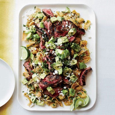 <p>To make his version of chilaquiles (fried tortilla chips lightly cooked in salsa), Jamie Bissonnette unabashedly opts for Fritos.</p><p><b>Recipe: </b><a href="http://gogonow.org/recipefinder/cola-marinated-flank-steak-frito-chilaquiles-recipe-fw0613%22 target="_blank"><b>Cola-Marinated Flank Steak with Frito Chilaquiles</b></a></p>