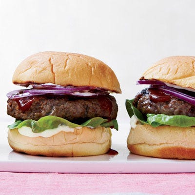 Cheesy Burgers with Soy-Spiked Ketchup <p>For these burgers, served medium-rare, he mixes beef with ingredients you might use for meat loaf, like pickles. On top: a ketchup he doctors with hoisin (for sweetness), lime juice (for tang), and soy sauce (for umami).</p><p><b>Recipe: </b><a href="http://gogonow.org/cheesy-burgers-soy-spiked-ketchup-recipe-fw0613%22 target="_blank"><b>Cheesy Burgers with Soy-Spiked Ketchup</b></a></p>