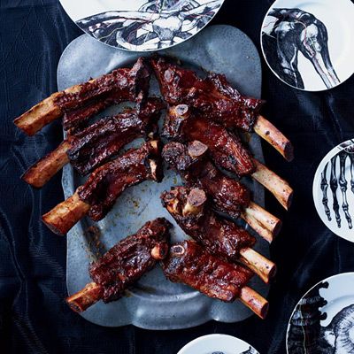 <p>Beef back ribs can be harder to find in butcher shops than short ribs, but chef David Burtka serves them on Halloween because they resemble human ribs. Here, he braises them in Coca-Cola and brushes them with homemade barbecue sauce before grilling them.</p>
<p><strong>Recipe:</strong> <a href="/recipefinder/grilled-beef-ribs-smoky-sweet-barbecue-sauce-recipe-fw1012" target="_blank"><strong>Grilled Beef Ribs with Smoky-Sweet Barbecue Sauce</strong></a></p>