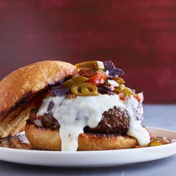 <p>To create these smoky, slightly spicy burgers, Bobby Flay took inspiration from another favorite bar food — nachos — and brought the two together into one savory treat.</p>
<p><b>Recipe:</b> <a href="http://www.delish.com/recipefinder/nacho-burgers-recipe-fw0112" target="_blank"><b>Nacho Burgers</b></a></p>