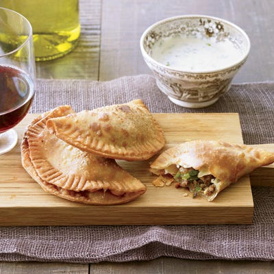 <p>At Besh Steak, chef John Besh prepares mini meat pies with house-made dough and a rich, spiced filling of beef, pork, and chicken liver sautéed in duck fat. At home, use store-bought empanada dough instead of making your own.</p><p><b>Recipe: </b><a href="/recipefinder/natchitoches-style-meat-pies-recipe-fw1111" target="_blank"><b>Natchitoches-Style Meat Pies</b></a></p>