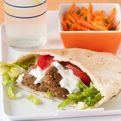 <p>Create a lowfat Middle Eastern feast with this tasty sandwich featuring warm falafel patties nestled into pita bread with shredded romaine lettuce, tomatoes and a creamy cucumber-yogurt sauce.</p><p><b>Recipe: </b><a href="http://delish.com/recipefinder/falafel-recipe-122648" target="_blank"><b>Steamed Chinese Dumplings</b></a></p>