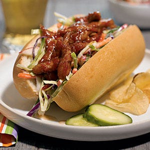 <p>You can't beat this Southern-style sandwich, with lean pork tenderloin coated in a succulent mix of barbecue and Worcestershire sauces and brown sugar, then wrapped in a soft bun with coleslaw for crunchy contrast.</p><p><b>Recipe: </b><a href="http://gogonow.org/recipefinder/pulled-pork-sandwich-recipe-122550%22 target="_blank"><b>Pulled Pork Sandwich</b></a></p>