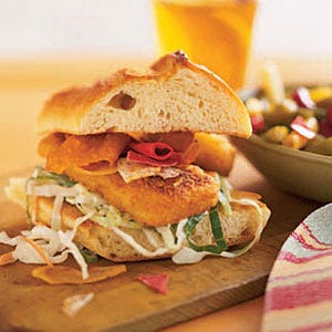 <p>Pressed for time? Try this tasty take on Britain's famed dish. It's ready in just 15 minutes and is full of crispy crunch, with breaded fish fillets stacked high with creamy coleslaw and vegetable chips.</p><p><b>Recipe: </b><a href="http://gogonow.org/recipefinder/fish-n-chips-sandwiches-recipe-121916%22 target="_blank"><b>Fish-n-Chips Sandwiches</b></a></p>