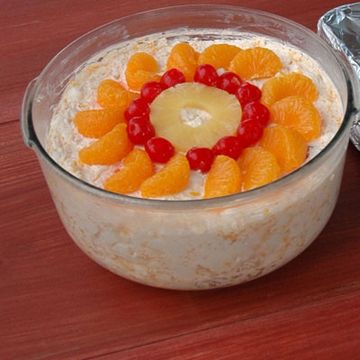 A decadent, almost dessertlike version of a fruit salad, the ambrosia salad usually contains pineapple, mandarin oranges, marshmallows, and coconut with a creamy agent (whipped cream, sour cream, or yogurt) to bind it all together.