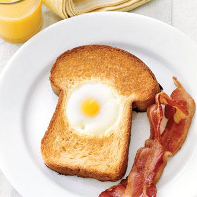 Egg-in-the-Hole <p>This hole-in-one beauty begins with a thick slice of buttered brioche bread. The freshest eggs will have centered, golden yolks and the best flavor. Drop in a jumbo egg and cook until the bread is toasted and the egg is set. Pair with bacon or roasted tomatoes. </p><p><b>Recipe: <a href="/recipefinder/egg-in-the-hole-19" target="_blank">Egg-in-the-Hole</a></b></p>