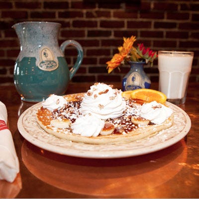 Alabama <p>After a lifetime of working in another sector, Broken Egg founder Ron Green finally found his way to his true calling. He opened the first of many successful Broken Egg establishments on Girod Street in Old Mandeville, Louisiana, in 1994. Since then, Green and his dedicated staff of breakfast enthusiasts have been turning out mind-boggingly addictive breakfasts. We're a huge advocate of their pancakes, included but not limited to the Bananas Foster, which can be made with traditional Buttermilk pancakes, Belgian Waffles, or French Toast. In a nod to New Orleans, these cakes are covered with bananas, pecans, and whipped cream. You will, as a matter of fact, go absolutely bananas for them!</p>
<p><i>Another Broken Egg, 2418 Montevallo Rd., Mountainbrook; (205) 871-7849; <a href="http://www.anotherbrokenegg.com/wp-content/uploads/2013/03/Menu_Tier3_Birmingham-1.pdf"
target="_blank">anotherbrokenegg.com</a></i></p>
<p><b>Homemade Version:</b> <a href="/recipefinder/banana-pancakes-recipe-mslo1210"><b>Banana Pancakes</b></a></p>