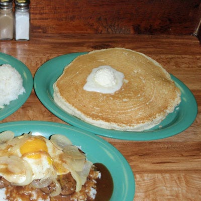 Hawaii <p>Hawaiian cuisine is perhaps known as much for its savory dishes as it is for its sweet dishes. Chibo Restaurant in Honolulu combines the best of both worlds with its savory pancake: the Okonomiyaki. Here, Hawaiian food enthusiasts can savor a pancake made with flour, egg, cabbage, and mountain yams. May we suggest topping it with some tropical fruit? You <i>are</i> in paradise, afterall.</p>
<p><i>Okonomiyaki Chibo, Royal Hawaiian Center, 2201 Kalakaua Ave., Suite A-305, Honolulu; (808) 922-9722; <a href="http://www.chibohawaii.com/"
target="_blank">chibohawaii.com</a></i></p>
<p><b>Homemade Version:</b> <a href="/recipefinder/cranberry-coconut-pancakes-recipe-opr1112"><b>Cranberry-Coconut Pancakes</b></a></p>