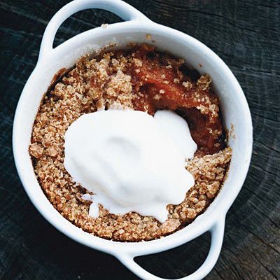 <p>Paul Virant bakes his simple peach crisps — a classic Southern dessert — in individual ramekins, but the sweet summer fruit and crunchy, buttery topping could be prepared in a single baking dish as well.</p>
<p><strong>Recipe:</strong> <a href="http://www.delish.com/recipefinder/peach-crisps-recipe"><strong>Peach Crisps</strong></a></p>