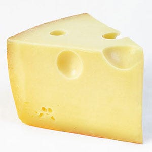 Swiss cheese gets its signature holes from bacterial cultures that cheese makers add to the milk before the curd forms. As the cheese ages, the propionic acid bacteria releases carbon dioxide gases that expand and cause the holes, says Sue Conley, co-author of <i>Cowgirl Creamery Cooks</i> and co-founder of San Francisco’s Cowgirl Creamery. The bacteria is naturally occurring in some other cheeses, and may cause small holes that can even be considered flaws, but with Swiss, cheese makers add it in larger quantities to intentionally achieve larger holes. Funny enough, she adds, you won’t find “Swiss cheese” in Switzerland—the term is used for cheeses made in the United States in the style of Emmenthaler, Switzerland’s traditional lowland cheese known for its sweet, nutty flavor and yes, “holey” texture.