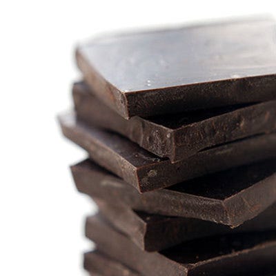<p>Attention chocoholics! You don't have to sacrifice your favorite sweet for firm skin. Natural cocoa is full of antioxidants, which break down fat in cellulite and improve the function of all cells, including skin-building ones, says Karst. The caffeine aids in dehydrating fat cells under skin, evening out the surface. Karst recommends satisfying your sweet tooth with 1 square or ounce of at least 80% dark chocolate per day to metabolize fat and keep skin dimple-free.</p>