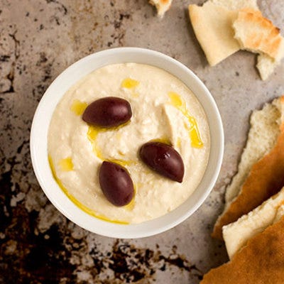 <p>This popular spread is a low-glycemic food, meaning your body can use it efficiently for energy, "resulting in smaller fat cells and a decreased appearance of or prevention of cellulite," says Dr. Kominiarek. While there's no particular component of hummus that fights cellulite most, the food puts only a small amount of glucose into the blood, causing a minimum insulin release. Since insulin is a fat storage hormone, eating low-glycemic foods prevents fat cells from expanding and forming cellulite.</p>