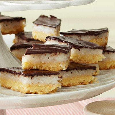 <p>If you're a fan of come-on-strong coconut, this dessert is for you. Rich coconut milk custard is nestled between a layer of toasted coconut crust and smooth chocolate in these decadent bars.</p>
<p><strong>Recipe: <a href="http://gogonow.org/recipefinder/coconut-joy-bars-recipe-ghk1212%22 target="_blank">Coconut Joy Bars</a></strong></p>