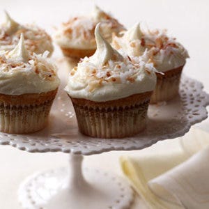 <p>The great thing about coconut is its versatility; it feels refreshing in warm weather and comforting in cold. This recipe makes the most of it, featuring a triple whammy of coconut in the batter — flakes, extract and milk — and a coconut cream cheese frosting.</p>
<p><strong>Recipe: <a href="http://gogonow.org/recipefinder/coconut-cupcakes-coconut-white-chocolate-frosting-recipe-122600%22 target="_blank">Coconut Cupcakes with Coconut-White Chocolate Frosting</a></strong></p>