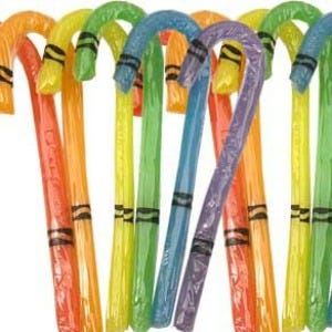 Thankfully these Crayola candy canes were inspired by the crayon colors and are not actually meant to taste like crayons. (After the gravy candy canes we weren't sure what to think!) These candies come in six different fruit flavors and each color turns your mouth a different color.
<br /><br />
<a href="http://sweetfactory.com/color-your-mouth-crayola-candy-canes-12-ct-case.html" target="_blank">sweetfactory.com</a>