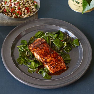 <p>Bourbon, honey, lime, and chili ignite a flavor riot in this Southern-style salmon recipe.  Paired with braised collard greens, it's the perfect healthy meal.</p>