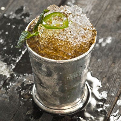 <p>Edward Lee rouses the Kentucky's classic cocktail with a homemade jalapeño simple syrup, bringing a whole new kick to the drink.</p>
<p><strong>Recipe: <a href="http://gogonow.org/recipefinder/jalapeno-spiked-bourbon-julep-recipe-clv0513%22 target="_blank">Jalapeño-Spiked Bourbon Julep</a></strong></p>