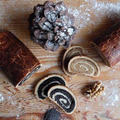 Beigli, Hungary <p>This pastry is ubiquitous with Christmas season in Hungary and traditionally comes with one of two decadent fillings — sweet, dense poppy seed paste or hearty minced walnuts. Like the chocolate chip cookie, you can walk into any bakery to pick up a roll in wintertime, but every family has their traditional take on the holiday dessert. If you're up for the challenge, try several versions and find your favorite. Hint: inventive Hungarians have been experimenting with new fillings like Chestnut puree and thick Nutella so don't feel bound to tradition.</p>