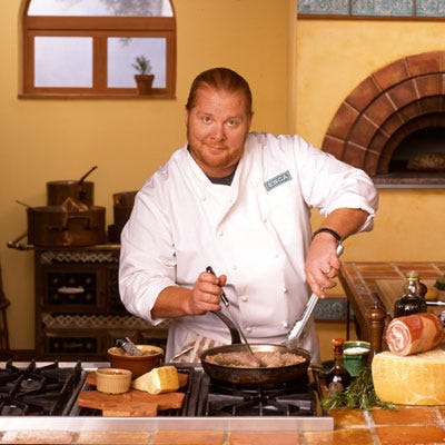 <p>Nineteen ninety-six brought two (soon-to-be) celebrity chefs to the network — Mario Batali and Bobby Flay. Flay was a young gun in New York's dining scene, with a dedicated following at his Flatiron restaurants, Bolo and Mesa Grill. Batali was cooking up a storm at his own eateries with business partner Joe Bastianich (son of PBS cooking show host Lidia Bastianich). Batali's first Food Network program, "Molto Mario," was a window into true Italian cuisine — not the Americanized version so many were accustomed to. Flay was asked to co-star in "Grillin' and Chillin'," and according to <i>From Scratch,</i> it was Flay's idea to "raise the profile" of outdoor cooking, adding recipes with lamb, lobster, and spice rubs.</p>
