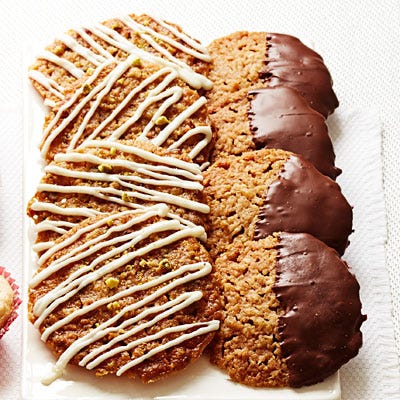 <p>Cranberry, white chocolate, and pistachio are the perfect salty-sweet-tart combination, and these cookies' subtle holiday colors make them perfect for taking along to Christmas parties or cookie swaps. Chocolate drizzle is optional!</p>
<p><strong>Recipe: <a href="http://gogonow.org/recipefinder/cranberry-pistachio-lace-cookies-recipe-ghk1213%22 target="_blank">Cranberry-Pistachio Lace Cookies</a></strong></p>