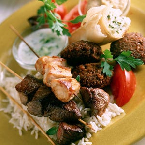 <p>Last year's best-selling cookbook <em>Jerusalem</em> helped build up steam for a taste of the Mideast. Signature dishes — skewered meat, tahini and yogurt sauces, smoky eggplant dips, lentil stews, hummus, and tabbouleh salads — all go nicely with other trends we've been watching: family-style dishes, lots of veggies, grains, and legumes in the center of the plate, and Greek yogurt in everything. This year's kale salads will be sprinkled with pomegranate seeds, slices of dates, and chunks of feta. New seasonings to add to your spice rack: za'atar and Aleppo pepper. Even breakfast menus will be affected: Instead of an omelet, order shakshuka, eggs poached in spicy tomato sauce.
</p>