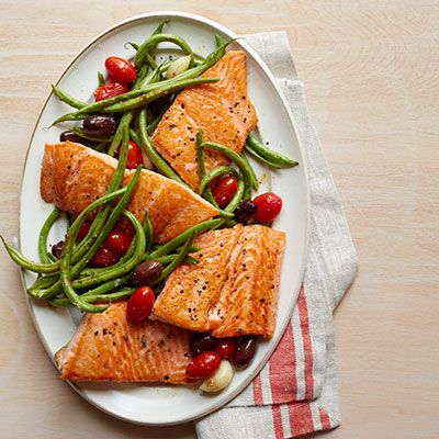 <p>Salmon's gorgeous color and delicate texture make it an indulgent, naturally-elegant dish you can feel good about eating. This Mediterranean-inspired dish adds just enough olive oil for the health benefits without excessive calories.</p>
<p><strong>Recipe: <a href="http://www.delish.com/recipefinder/roasted-salmon-green-beans-tomatoes-recipe-wdy1013" target="_blank">Roasted Salmon, Green Beans, and Tomatoes</a></strong></p>