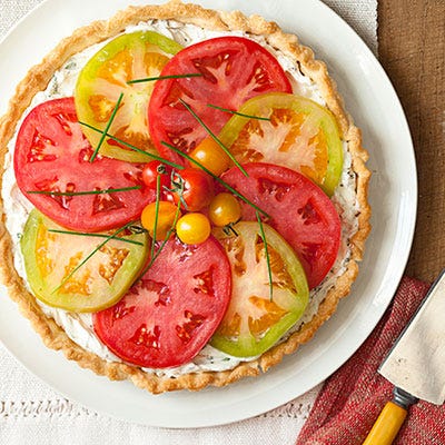 <p>Doses of cream cheese and heavy cream are what make this goat cheese tart such a creamy treat. Top with tomatoes and chives to add a fresh touch to this rich dish.</p>
<p><strong>Recipe: <a href="http://gogonow.org/recipefinder/provencal-goat-cheese-tart-recipe-ghk0813%22 target="_blank">Provençal Goat Cheese Tart</a></strong></p>