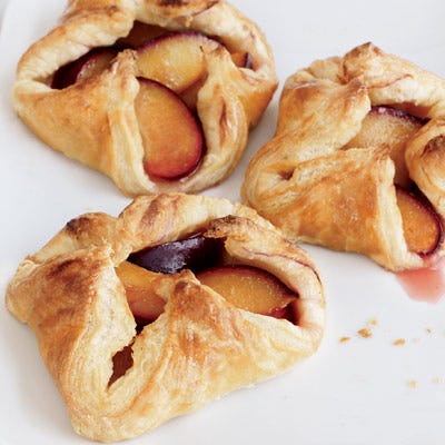 <p>For her elegant interpretation of fruit danish, chef Grace Parisi tosses wedges of big purple plums with sugar and cardamom, then pinches them into neat little puff pastry pockets and bakes them.</p>
<p><b>Recipe:</b> <a href="http://gogonow.org/recipefinder/plum-puff-dumplings-recipe%22 target="_blank"><b>Plum Puff Dumplings</b></a></p>
