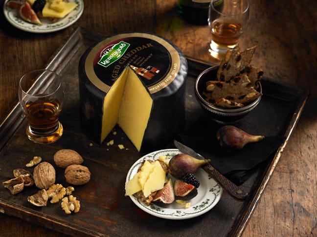 <p>You would think the strong flavors of Cheddar and Irish whiskey would fight for prevalence when combined, but something much more subtle and delicious happens — the whiskey takes a back seat to that robust Cheddar flavor you love, bolstering it with hints of wood. Just think of the grilled cheese possibilities. For those of you who love the combination of savory and sweet, dare we suggest cheddar pancakes doused in bourbon-infused maple syrup?</p>
<p><em>Kerrygold Aged Cheddar with Irish Whiskey; $8.99 for 8 ounces; <a href="http://www.igourmet.com/shoppe/Kerrygold-Aged-Cheddar-with-Irish-Whiskey.asp" target="_blank">buy here</a></em></p>
