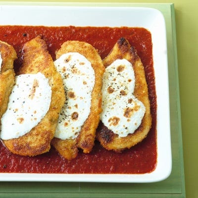 <p>Although this dish is traditionally served with a side of pasta, a crisp salad dressed with oil, vinegar, and herbs is also a nice accompaniment. This chicken also makes wonderful leftovers. Reheat it for 10 minutes; try it in a sandwich with a little extra sauce on the side. </p>
<p><strong>Recipe: <a href="http://gogonow.org/recipefinder/chicken-parmigiana-recipe-mslo0214%22%3EChicken Parmigiana</a></strong></p>