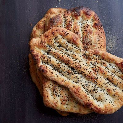<p>Nan-e barbari is a classic Persian flatbread that gets crisp and golden in the oven, thanks to roomal, a flour paste that's spread over the bread before it's baked. Jessamyn Rodriguez likes to serve it with feta and olives.</p><p><strong>Recipe:</strong> <a href="http://www.delish.com/recipefinder/persian-flatbread-recipe-fw0213"><strong>Persian Flatbread</strong></a></p>