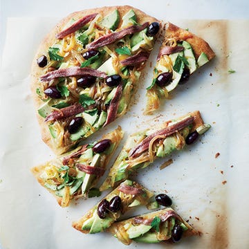 <p>This pizza-like tart, pissaladière, is a specialty of Nice, France. The traditional toppings include caramelized onions, anchovies, and olives but here, creamy slices of avocado are added as well. Using store-bought pizza dough makes quick work of the crust.</p>
<p><strong>Recipe:</strong> <a href="http://gogonow.org/recipefinder/avocado-pissaladiere-recipe-fw0214%22%3E%3Cstrong%3EAvocado Pissaladière</strong></a></p>
