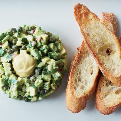 <p>Vegetarians can enjoy this fun riff on steak tartare, in which finely diced avocados are seasoned with all of the same ingredients as the meaty classic: capers, onions, mustard, and Worcestershire sauce.</p>
<p><strong>Recipe:</strong> <a href="http://gogonow.org/recipefinder/avocado-tartare-recipe-fw0214%22%3E%3Cstrong%3EAvocado Tartare</strong></a></p>
