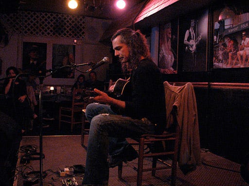 <p>While this humble cafe has hit TV fame on <em>Nashville</em>, it still holds true to its dedication to the "heroes behind the hits" and acoustic sound. The original owner sold the venue to the Nashville Songwriters Association International, (NSAI) to continue its legacy of celebrating songwriters. The menu may jump from Chicken Fingers to Quesadillas, but that just means you're sure to find something you'll enjoy while listening to the music you know in a whole new way.</p>
<p><em>Bluebird Cafe: 4104 Hillsboro Pike, Nashville, TN 37215; (615) 383-1461; <a href="http://www.bluebirdcafe.com/" target="_blank">bluebirdcafe.com</a></em></p>