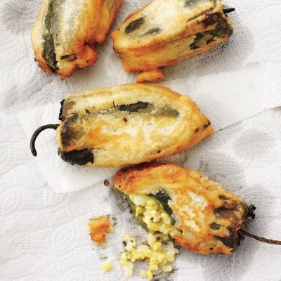 Poblano Chiles Stuffed with Corn and Monterey Jack Cheese <p>You can stuff anything into a poblano chile and fry it, and it will taste good. Serve this rendition with sour cream as a side dish or as a vegetarian main dish.</p>
<p><strong>Recipe:</strong> <a href="http://gogonow.org/recipefinder/poblano-chiles-stuffed-corn-monterey-jack-cheese-recipe-mslo0913%22 target="_blank"><strong>Poblano Chiles Stuffed with Corn and Monterey Jack Cheese</strong></a></p>