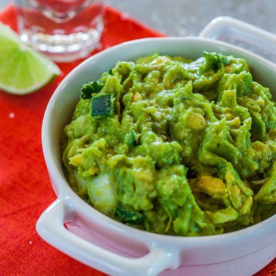 <p>Tequila is a strong flavor, so more is not necessarily more in this recipe. You should also use high-quality tequila something you'd be fine drinking. Mezcal would also work very well, providing an additional smoky note.</p><p><strong>Recipe:</strong> <a href="http://gogonow.org/recipefinder/guacamole-tequila-lime-recipe-fw0214%22%3E%3Cstrong%3EGuacamole with Tequila and Lime</strong></a></p>