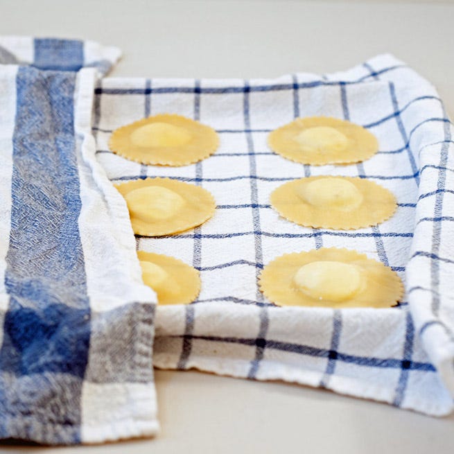 <p>Whether the homemade pasta is destined for ravioli, lasagna, or wide ribbons like fettuccine, tagliatelle, or linguini, now is the time to form it into its final shape. </p>
<p>For ravioli, follow <a href="http://www.yumsugar.com/How-Make-Ravioli-31123052" target="_blank">these easy instructions</a>. For lasagna, trim the sheets to fit in a casserole dish. For tagliatelle and other ribbon-like strands of pasta, portion it out with a pizza cutter, sharp paring knife, or the fettuccine or linguini attachments on your pasta roller.</p>