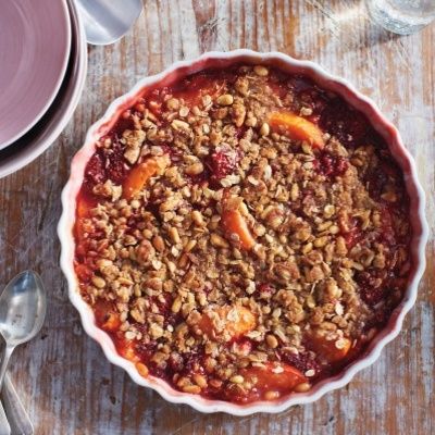 <p>In this crisp, the apricots hold their shape. The strawberries, in contrast, become saucelike. A 9 1/2-inch shallow round baking dish or pie plate gives this crisp the ideal ratio of fruit filling to crumble topping.</p>
<p><strong>Recipe: <a href="http://www.delish.com/recipefinder/strawberry-apricot-crisp-pine-nut-crumble-recipe-mslo0414" target="_blank">Strawberry and Apricot Crisp with Pine-Nut Crumble</a></strong></p>