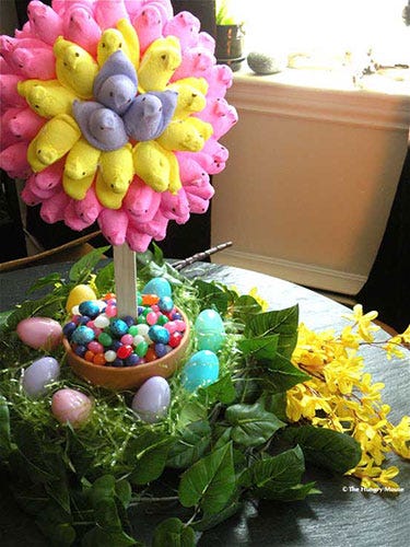 Marshmallow chicks get a chic makeover with this flowerpot craft. And the "soil" is much sweeter thanks to jelly beans.
<br /><br />
Get the instructions at <a href="http://www.thehungrymouse.com/2011/04/11/peep-topiary-plus-other-easter-table-top-decorating-ideas/" target="_blank">The Hungry Mouse</a>