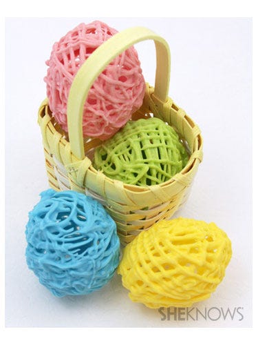 Fill a basket with these adorable chocolate egg shells. All you need are balloons and chocolate candy melts. Good news for imperfect artists: The messier the drizzling, the funkier the resulting pattern will be.
<br /><br />
Get the instructions at <a href="http://www.sheknows.com/food-and-recipes/articles/987631/hollow-chocolate-easter-egg-recipe" target="_blank">She Knows</a>