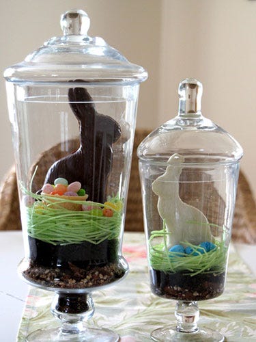 This sophisticated centerpiece puts those ubiquitous boxed bunnies center stage. The tasty rabbits are right at home on a bed of Oreo dirt and candy grass.
<br /><br />
Get the instructions at <a href="http://www.hungryhappenings.com/2012/04/chocolate-bunny-silhouettes-made-using.html" target="_blank">HGTV Gardens</a>