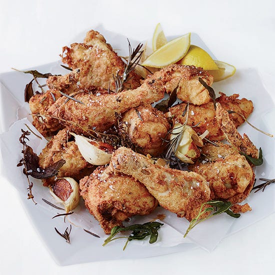 <p>To make his phenomenal fried chicken, Tyler Florence first bakes it low and slow, so it's juicy. Then he coats the chicken pieces in seasoned flour and fries them in oil that's been flavored with garlic and herbs.</p><p><strong>Recipe:</strong> <a href="http://gogonow.org/recipefinder/extra-crispy-fried-chicken-recipe-fw0314%22%3E%3Cstrong%3EExtra Crispy Fried Chicken</strong></a></p>