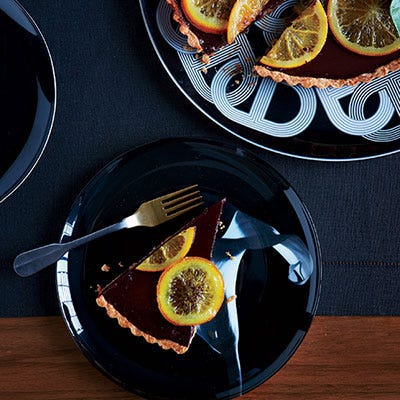 Bittersweet Chocolate-Truffle Tart with Candied Oranges <p>Sure, a day full of lovey couples can get a little bitter for those who haven't paired off, but all of you dessert connoisseurs know that some of the best sweets have a touch of the bitter. Embrace the duality of the day and use it to your advantage by making this divine bittersweet chocolate tart for your singles gathering.</p>
<p><strong>Recipe: <a href="http://gogonow.org/recipefinder/bittersweet-chocolate-truffle-tart-candied-oranges-recipe-fw1213%22 target="_blank">Bittersweet Chocolate-Truffle Tart with Candied Oranges</a></strong></p>