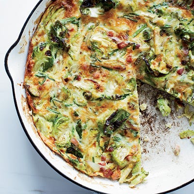 <p>This quick, hearty frittata makes a substantial meal, as it is loaded with crispy bacon and brussels sprouts.</p><p><strong>Recipe:</strong> <a href="http://gogonow.org/recipefinder/brussels-sprout-bacon-gruyere-frittata-recipe-fw0114%22%3E%3Cstrong%3EBrussels Sprout, Bacon, and Gruyère Frittata</strong></a></p>
