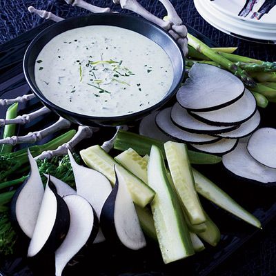 <p>Loaded with parsley, tarragon, and chives, this creamy dip has a texture and color perfect for all sorts of Halloween gags. It would also be delicious served with poached chicken or seafood.</p><br /> <p><b>Recipe: </b><a href="http://www.delish.com/recipefinder/green-goddess-dip-crudites-recipe-fw1012"><b>Green Goddess Dip with Crudités</b></a></p>