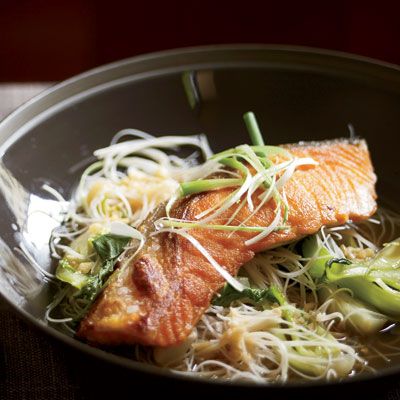 Patrick Dunlea was booted off <i>Top Chef</i> Season 5's first episode because his salmon and bok choy were lackluster, and his black-rice noodles were mushy. <i>Top Chef</i> judge Gail Simmons amps up the broth with soy sauce, rice wine vinegar, ginger, and garlic and uses white-rice noodles instead of black (they're easier to find), cooked briefly to keep their texture firm.<br /><br /><b>Recipe: <a href="/recipefinder/crisp-asian-salmon-bok-choy-rice-noodles-recipe" target="_blank">Crisp Asian Salmon with Bok Choy and Rice Noodles</a></b>
