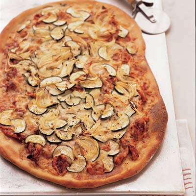 <p>Piled with sliced zucchini and shredded chicken and cheese, this barbecue-sauced pizza tempts kids and parents alike.</p>
<p><b>Recipe:</b> <a href="http://gogonow.org/recipefinder/barbecued-chicken-pizza-recipe%22 target="_blank"><b>Barbecued Chicken Pizza</b></a></p>